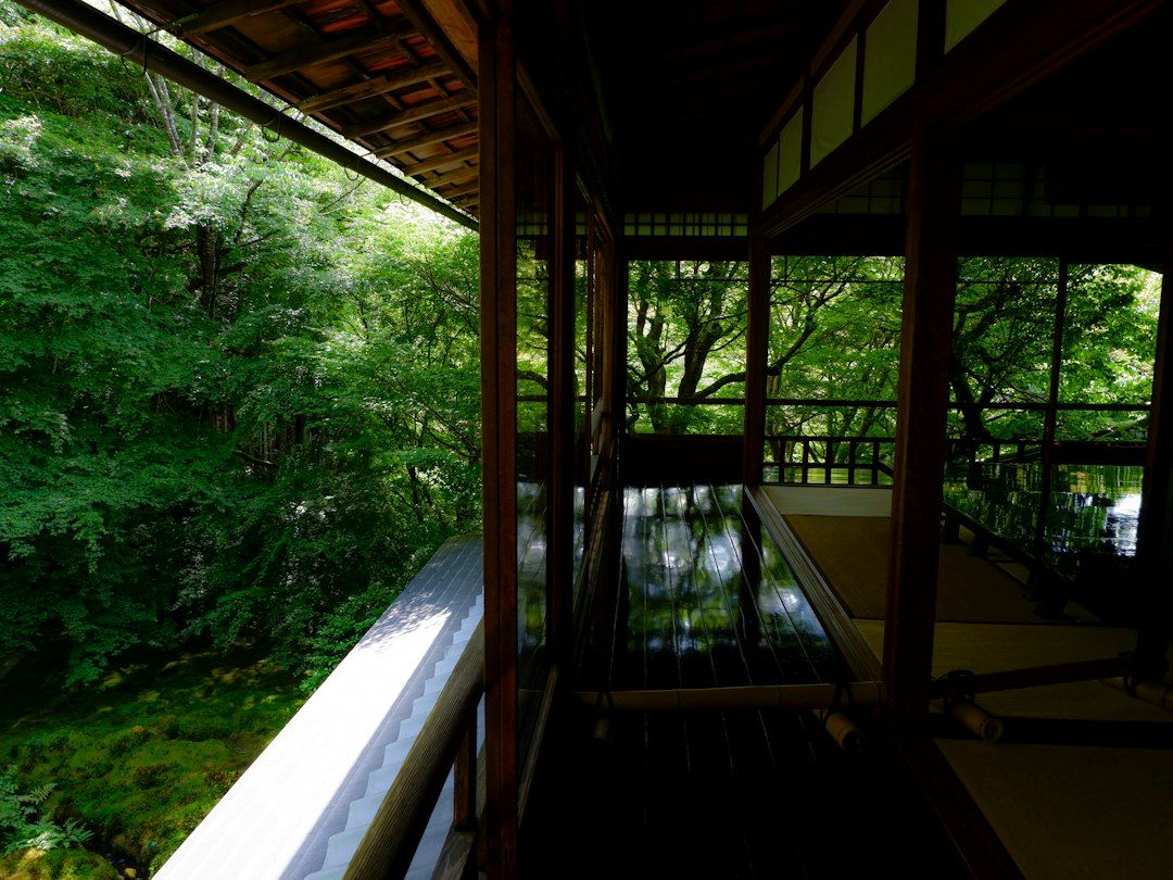 Tatami room with a soaking tub, typical of Kyoto ryokan-style boutique hotels