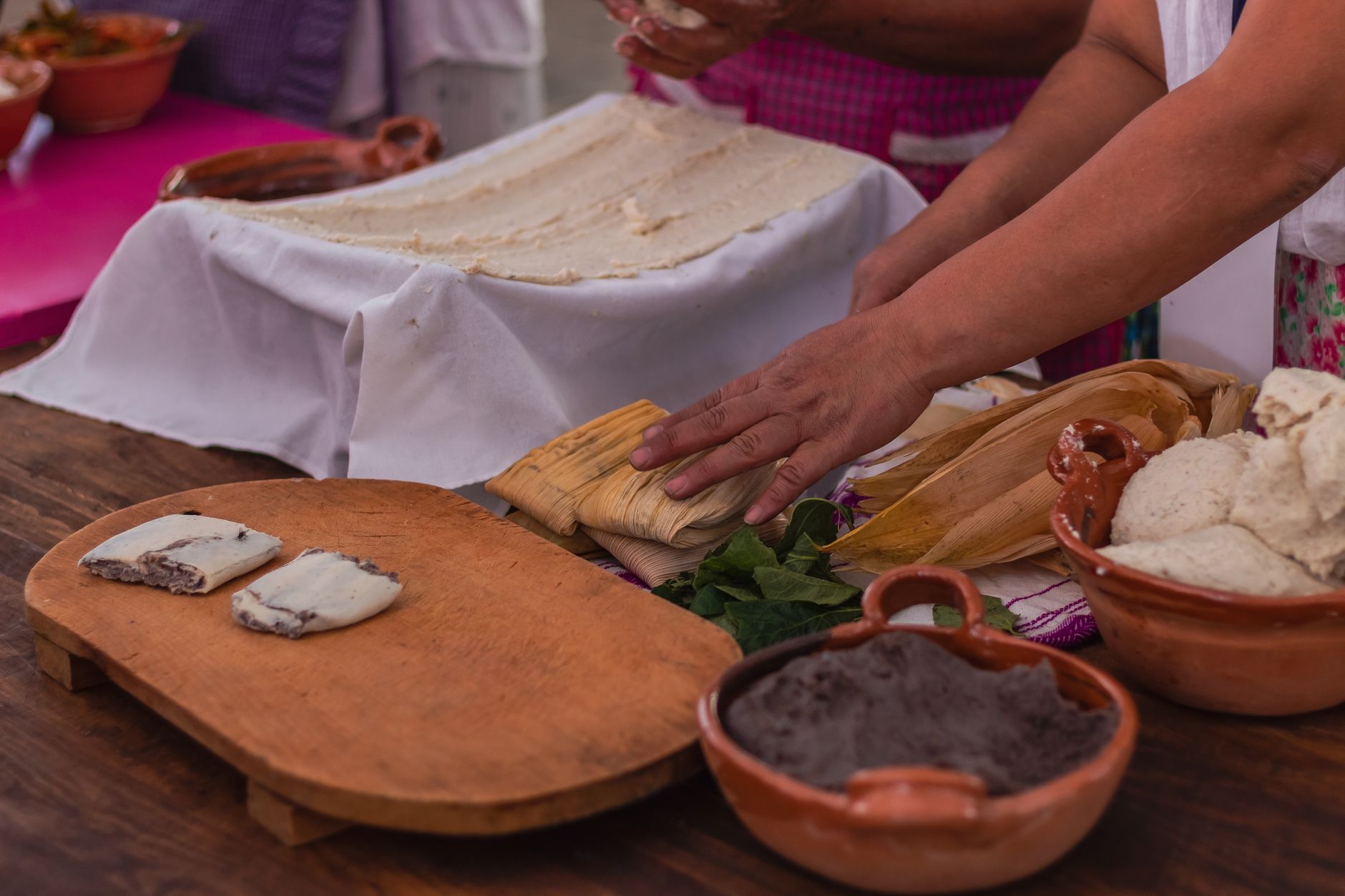 Steamed tamales wrapped in corn husk