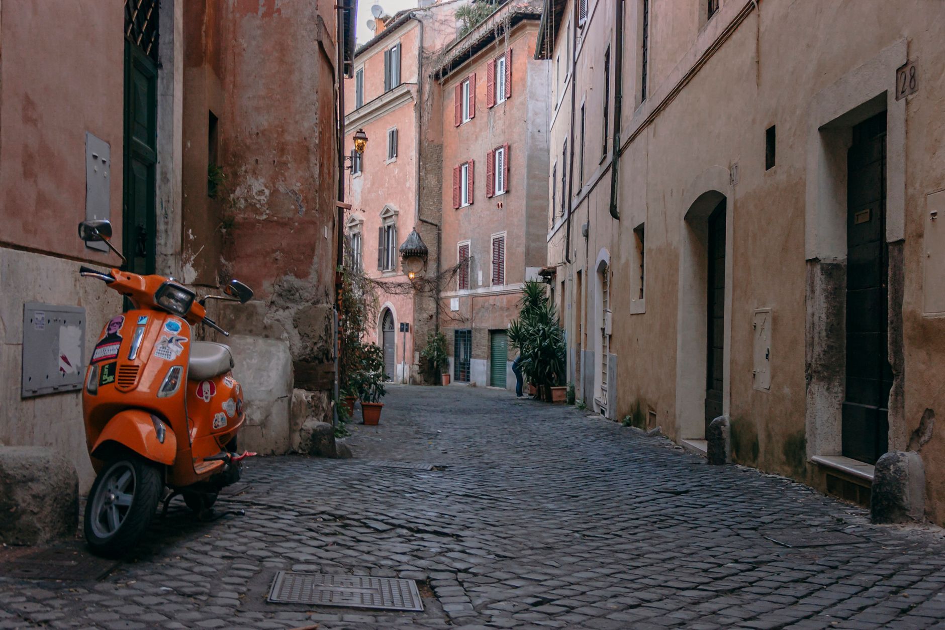 A narrow street in the Trastevere neighborhood of Rome